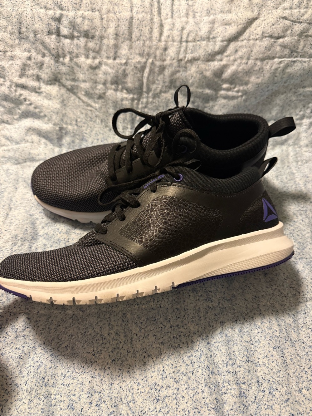 Reebok women’s  Black sneakers  with Purple Accents